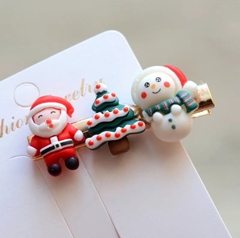 Santa, Tree and White Snowman Hair Slide
