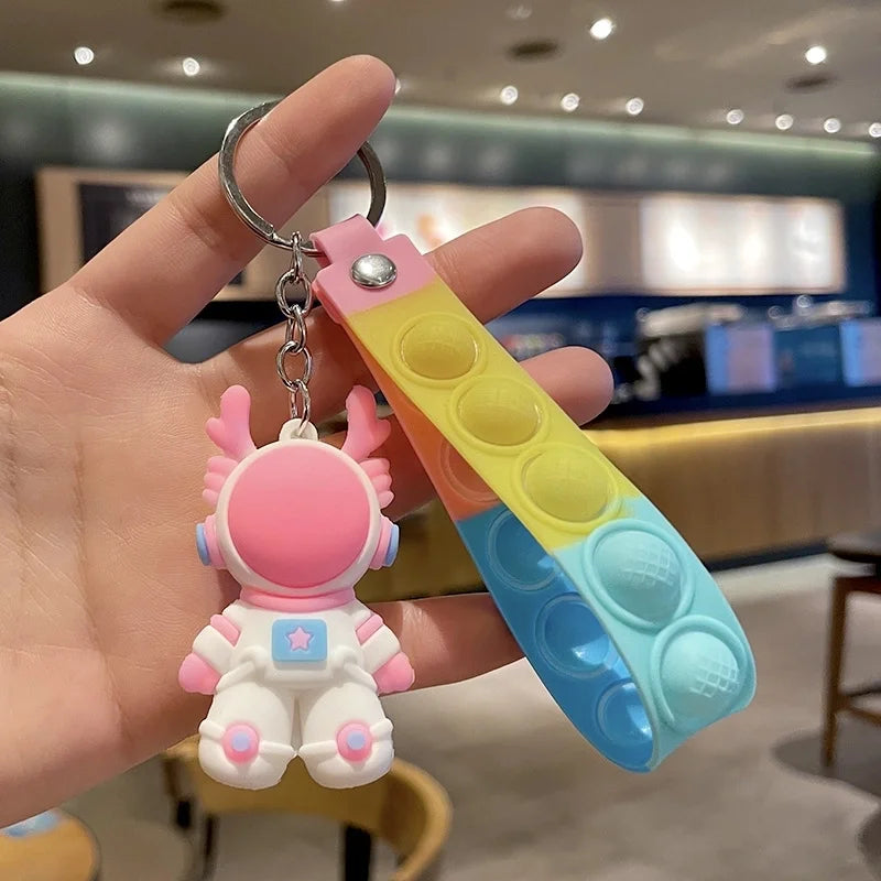 Pink & White Dragon Astronaut Popper Keyring